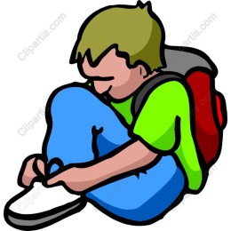 Vibrant Young Boy Tying Shoe